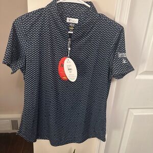 Greg Norman Women’s short sleeve golf shirt Medium blue new with tags